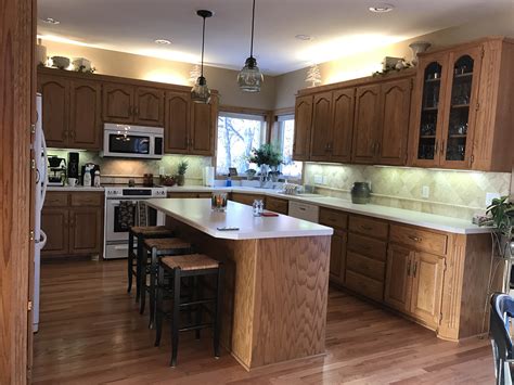 stainless steel appliances with light oak cabinets|updating honey oak cabinets.